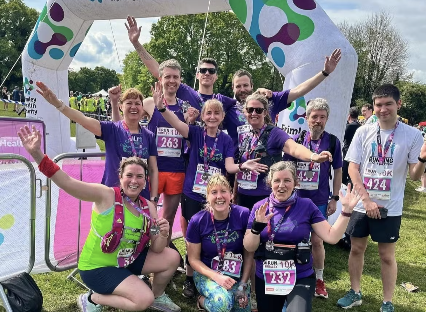 Cove Joggers at the Frimley 10k finish with medals.